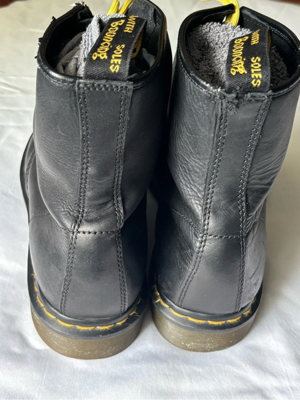 Dr. Martens Black Leather Boots with Yellow Laces